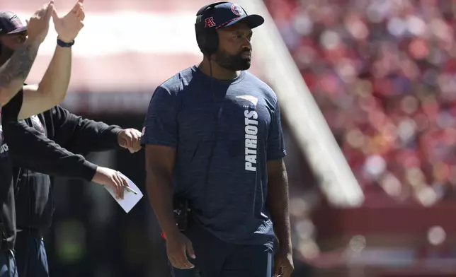 New England Patriots head coach Jerod Mayo watches from the sideline during the first half of an NFL football game against the San Francisco 49ers in Santa Clara, Calif., Sunday, Sept. 29, 2024. (AP Photo/Jed Jacobsohn)