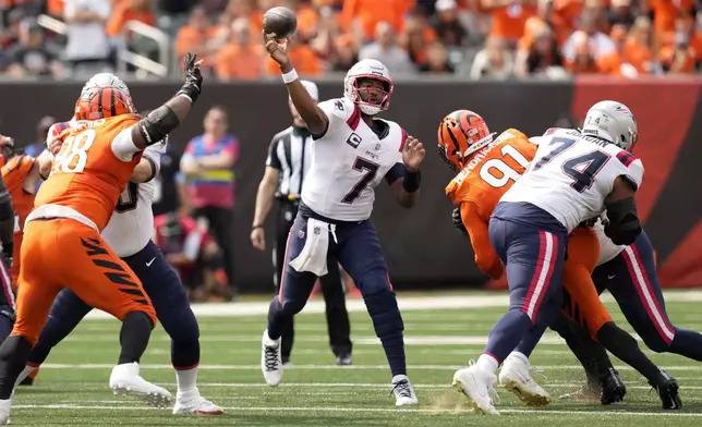 New England Patriots quarterback Jacoby Brissett (7) throws a pass during the second half of an NFL football game against the Cincinnati Bengals, Sunday, Sept. 8, 2024, in Cincinnati. (AP Photo/Carolyn Kaster)