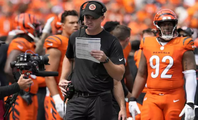 Cincinnati Bengals head coach Zac Taylor watches from the sideline during the first half of an NFL football game against the New England Patriots, Sunday, Sept. 8, 2024, in Cincinnati. (AP Photo/Jeff Dean)