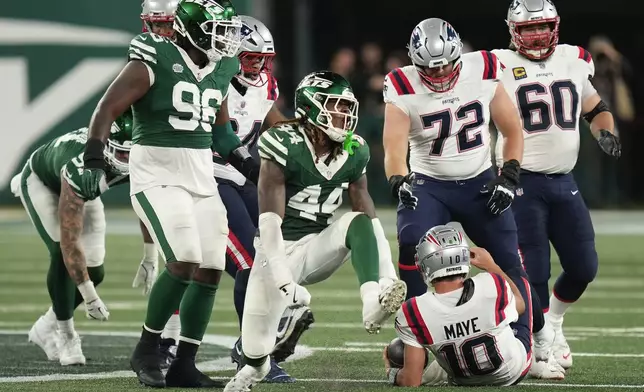 New York Jets linebacker Jamien Sherwood (44) reacts after sacking New England Patriots quarterback Drake Maye (10) during the fourth quarter of an NFL football game, Thursday, Sept. 19, 2024, in East Rutherford, N.J. (AP Photo/Seth Wenig)