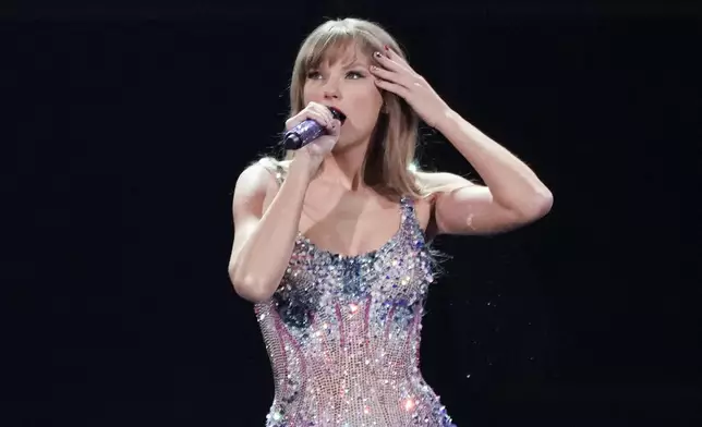 FILE - Taylor Swift performs during the opener of her Eras tour Friday, March 17, 2023, at State Farm Stadium in Glendale, Ariz. (AP Photo/Ashley Landis, File)