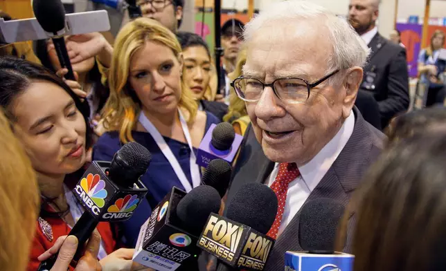 FILE - Warren Buffett, Chairman and CEO of Berkshire Hathaway, speaks to reporters before presiding over the annual shareholders meeting in Omaha, Neb., May 4, 2019. (AP Photo/Nati Harnik, File)