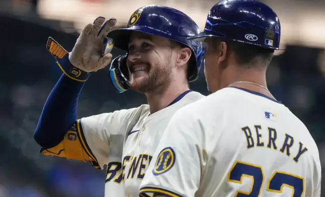 Milwaukee Brewers' Brice Turang reacts after hitting an RBI single during the sixth inning of a baseball game against the Philadelphia Phillies Monday, Sept. 16, 2024, in Milwaukee. (AP Photo/Morry Gash)