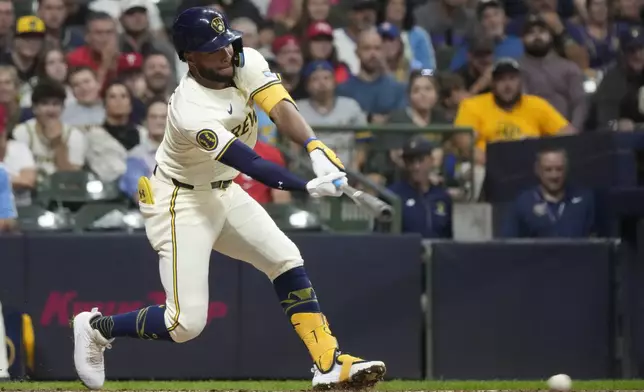 Milwaukee Brewers' Jackson Chourio hits a single during the sixth inning of a baseball game against the Philadelphia Phillies Tuesday, Sept. 17, 2024, in Milwaukee. (AP Photo/Morry Gash)