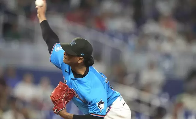 Miami Marlins starting pitcher Edward Cabrera throws during the fifth inning of a baseball game against the Philadelphia Phillies, Sunday, Sept. 8, 2024, in Miami. (AP Photo/Lynne Sladky)