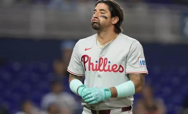 Philadelphia Phillies' Nick Castellanos reacts after lining out during the third inning of a baseball game against the Miami Marlins, Thursday, Sept. 5, 2024, in Miami. (AP Photo/Lynne Sladky)