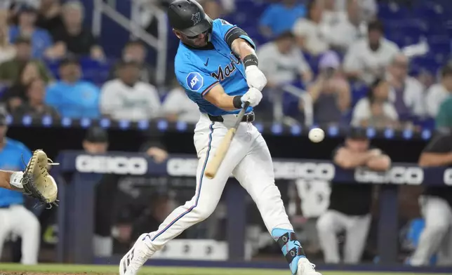 Miami Marlins' Connor Norby hits a two-run home run during the third inning of a baseball game against the Philadelphia Phillies, Sunday, Sept. 8, 2024, in Miami. (AP Photo/Lynne Sladky)