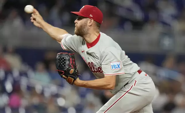 Philadelphia Phillies starting pitcher Zack Wheeler throws during the first inning of a baseball game against the Miami Marlins, Friday, Sept. 6, 2024, in Miami. (AP Photo/Lynne Sladky)