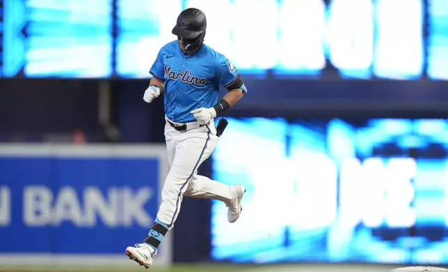 Miami Marlins' Connor Norby runs the bases after hitting a two-run home run during the first inning of a baseball game against the Philadelphia Phillies, Sunday, Sept. 8, 2024, in Miami. (AP Photo/Lynne Sladky)