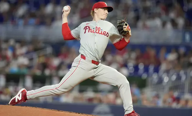 Philadelphia Phillies starting pitcher Seth Johnson throws during the first inning of a baseball game against the Miami Marlins, Sunday, Sept. 8, 2024, in Miami. (AP Photo/Lynne Sladky)