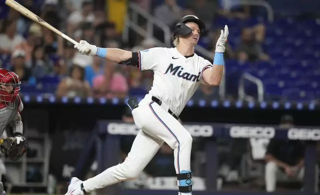 Miami Marlins' Kyle Stowers strikes out swinging during the second inning of a baseball game against the Philadelphia Phillies, Thursday, Sept. 5, 2024, in Miami. (AP Photo/Lynne Sladky)