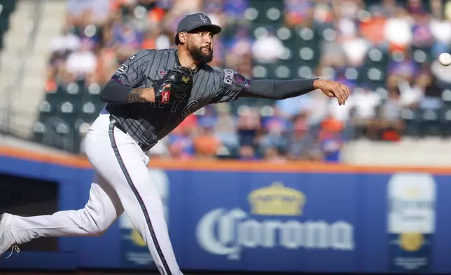 New York Mets' Sean Manaea pitches during the first inning of a baseball game against the Philadelphia Phillies, Saturday, Sept. 21, 2024, in New York. (AP Photo/Noah K. Murray)