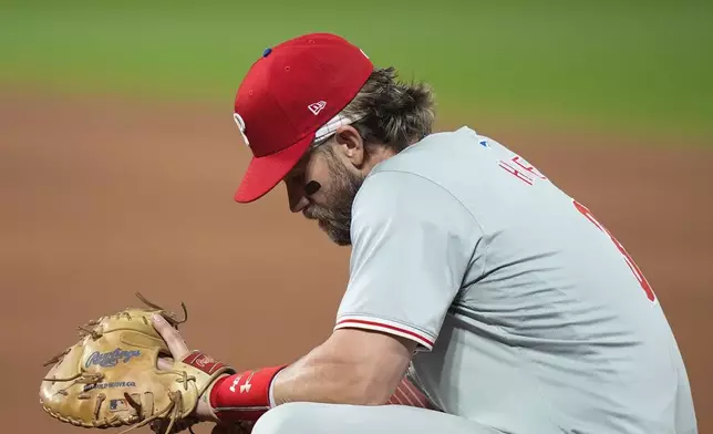 Philadelphia Phillies' Bryce Harper reacts during the fourth inning of a baseball game against the New York Mets, Thursday, Sept. 19, 2024, in New York. (AP Photo/Frank Franklin II)