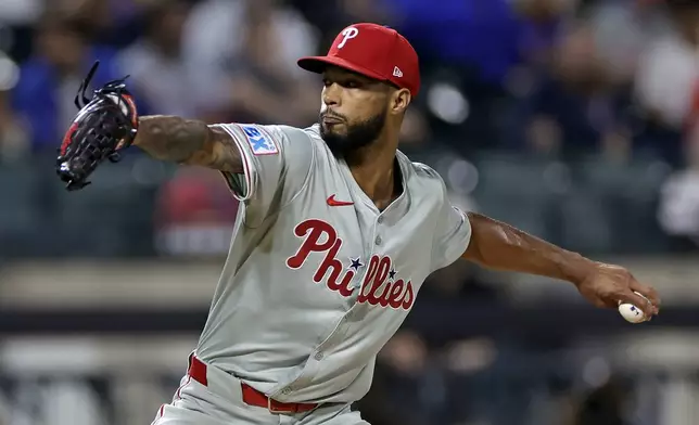 Philadelphia Phillies' Cristopher Sanchez pitches during the first inning of a baseball game against the New York Mets, Friday, Sept. 20, 2024, in New York. (AP Photo/Adam Hunger)