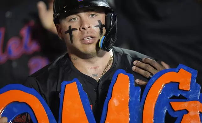 New York Mets' Francisco Alvarez celebrates with teammates after hitting a three-run home run during the fourth inning of a baseball game against the Philadelphia Phillies, Thursday, Sept. 19, 2024, in New York. (AP Photo/Frank Franklin II)