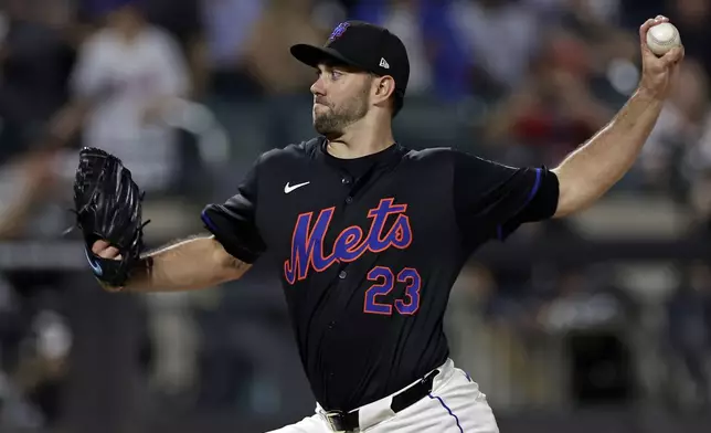 New York Mets' David Peterson pitches during the first inning of a baseball game against the Philadelphia Phillies Friday, Sept. 20, 2024, in New York. (AP Photo/Adam Hunger)