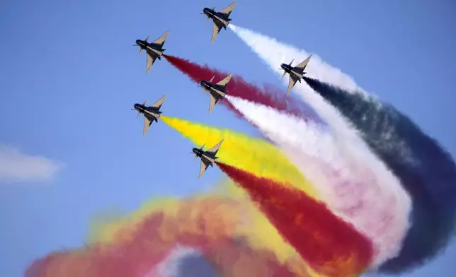 Chinese J-10 fighter jets perform during the first edition of the Egypt International Airshow at al-Alamein airport, Wednesday, Sept. 4, 2024. (AP Photo/Amr Nabil)