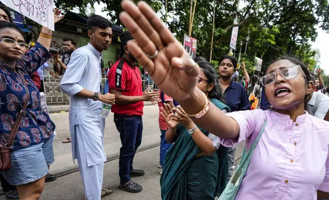 A woman shouts slogans as she joins a rally to protest against the rape and murder of a resident doctor at a government hospital in August, in Kolkata, India, Sunday, Sept. 1, 2024. (AP Photo/Bikas Das)