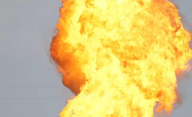 Firefighters respond to a pipeline fire Monday, Sept. 16, 2024, in Deer Park, Texas. (Yi-Chin Lee/Houston Chronicle via AP)