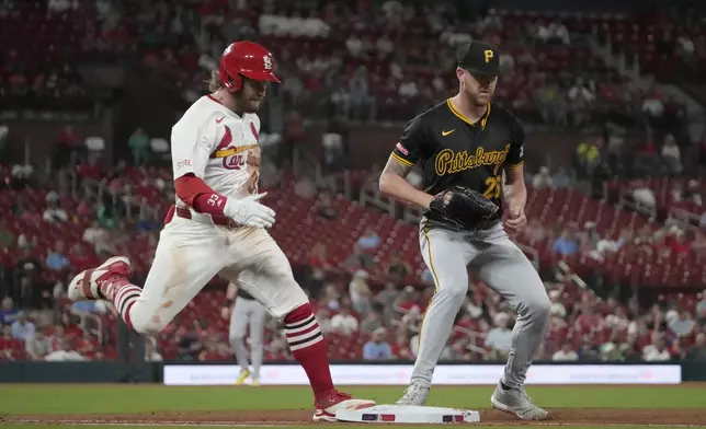 St. Louis Cardinals' Brendan Donovan, left, grounds out as Pittsburgh Pirates starting pitcher Bailey Falter covers first during the fourth inning of a baseball game Tuesday, Sept. 17, 2024, in St. Louis. (AP Photo/Jeff Roberson)