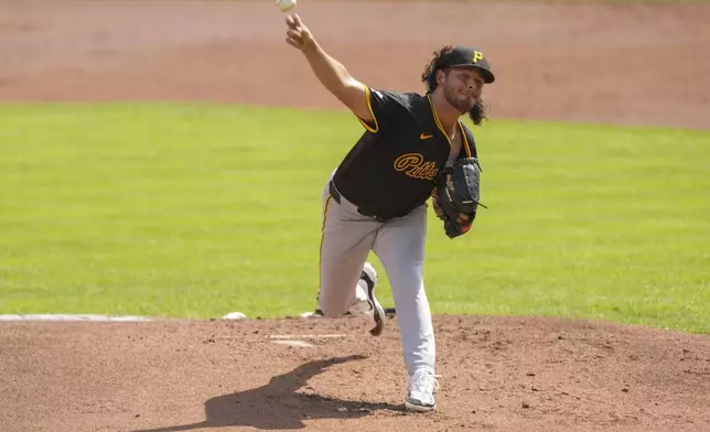 Pittsburgh Pirates starting pitcher Jared Jones throws during the first inning of a baseball game against the Cincinnati Reds, Saturday, Sept. 21, 2024, in Cincinnati. (AP Photo/Carolyn Kaster)