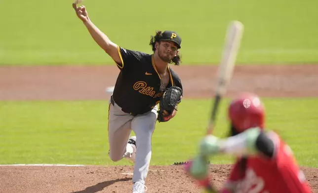 Pittsburgh Pirates starting pitcher Jared Jones throws during the first inning of a baseball game against the Cincinnati Reds, Saturday, Sept. 21, 2024, in Cincinnati. (AP Photo/Carolyn Kaster)