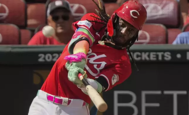 Cincinnati Reds' Elly De La Cruz hits a three-run homer during the fourth inning of a baseball game against the Pittsburgh Pirates, Saturday, Sept. 21, 2024, in Cincinnati. (AP Photo/Carolyn Kaster)