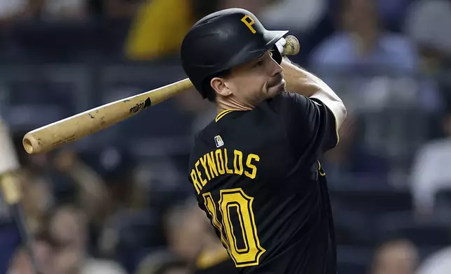 Pittsburgh Pirates' Bryan Reynolds hits a home run during the sixth inning of a baseball game against the New York Yankees, Friday, Sept. 27, 2024, in New York. (AP Photo/Adam Hunger)