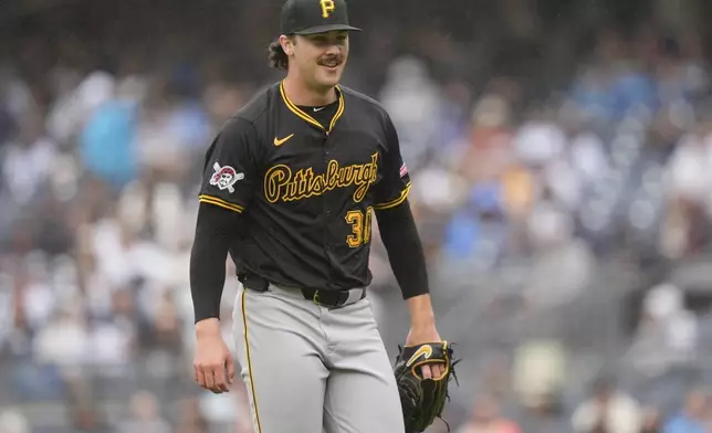 Pittsburgh Pirates' Paul Skenes smiles after the second inning of a baseball game against the New York Yankees, Saturday, Sept. 28, 2024, in New York. (AP Photo/Frank Franklin II)