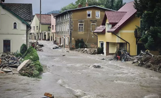 This handout photo provided by the State Fire Service of Poland, shows flooded street in the town of Nysa, southwestern Poland, Tuesday, Sept. 17, 2024. Authorities said the town has avoided major flooding, unlike many other locations in the region. (Maciej Krysinski/KG PSP via AP)