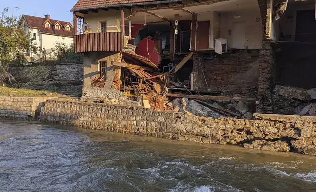 This handout photo provided by the State Fire Service of Poland, shows damages after the flooding in southwestern Poland, Ladek Zdroj, Poland, on Thursday, Sept. 19 , 2024. (Grzegorz Rozanski/KG PSP via AP)