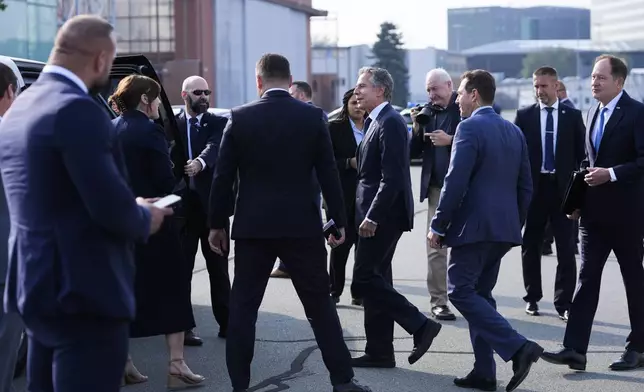 U.S. Secretary of State, Antony Blinken, center, arrives at Chopin Airport in Warsaw, Poland, Thursday, Sept. 12, 2024. (AP Photo/Mark Schiefelbein, Pool)