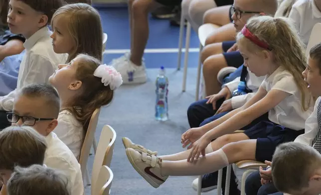 Children gather for the ceremonial first day of school in Warsaw, Poland, Monday, Sept 2, 2024. ( AP Photo/Czarek Sokolowski)