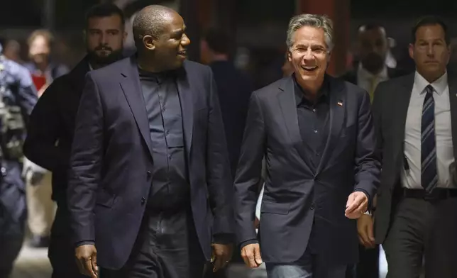 British Foreign Secretary David Lammy, front left, and U.S. Secretary of State Antony Blinken board a train at Przemysl train station in Poland Wednesday, Sept. 11, 2024 as they prepare to travel to Ukraine. (Leon Neal/Pool Photo via AP)