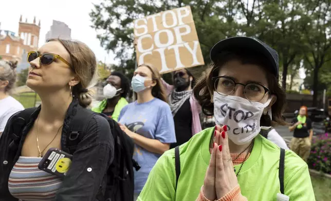 Opponents of an under-construction law enforcement training center known to some as "Cop City," protest at City Hall in Atlanta on Monday, Sept. 16, 2024. (Arvin Temkar/Atlanta Journal-Constitution via AP)