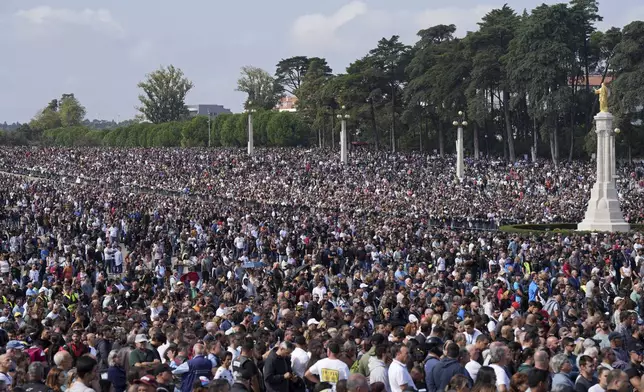 Tens of thousands, 180.000 according to the organization, gather at the Roman Catholic holy shrine of Fatima during the IX Pilgrimage of the Blessing of Helmets, in Fatima, Portugal, Sunday, Sept. 22, 2024. (AP Photo/Ana Brigida)