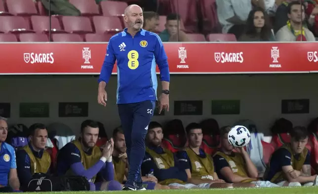 Scotland's head coach Steve Clarke reacts during the UEFA Nations League soccer match between Portugal and Scotland at the Luz stadium in Lisbon, Portugal, Sunday, Sept. 8, 2024. (AP Photo/Armando Franca)