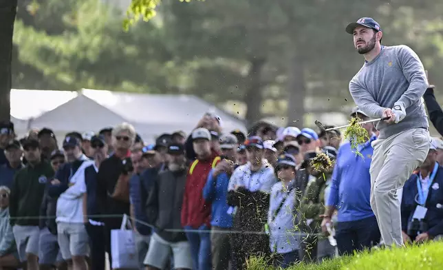 United States team member Patrick Cantlay plays a shot on the sixth hole during the third round at the Presidents Cup golf tournament at Royal Montreal Golf Club in Montreal Saturday, Sept. 28, 2024. (Graham Hughes/The Canadian Press via AP)