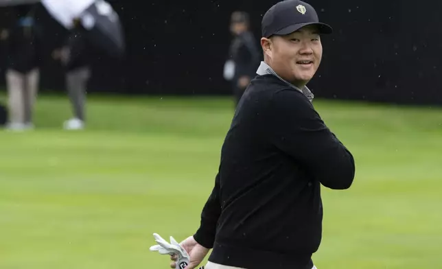 International team member Sungjae Im, of South Korea, smiles as he finishes his practice session at the Presidents Cup golf tournament, Monday, Sept. 23, 2024, in Montreal. (Christinne Muschi/The Canadian Press via AP)