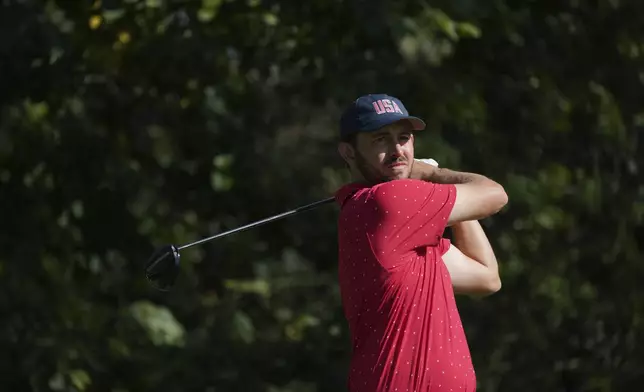 United States team member Patrick Cantlay hits from the fourth tee during a fifth-round singles match at the Presidents Cup golf tournament at Royal Montreal Golf Club, Sunday, Sept. 29, 2024, in Montreal. (Christinne Muschi/The Canadian Press via AP)