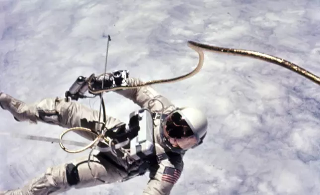 In this photo provided by NASA, astronaut Ed White performs the U.S.'s first spacewalk on June 3, 1965, during the Gemini 4 mission. (James McDivitt/NASA via AP)