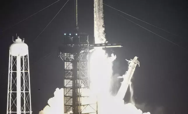 A SpaceX Falcon 9 rocket with a crew of four lifts off from pad 39A at the Kennedy Space Center in Cape Canaveral, Fla., Tuesday, Sept. 10, 2024. (AP Photo/John Raoux