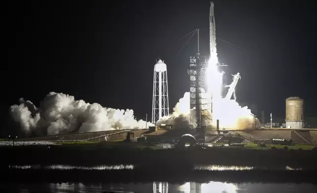 A SpaceX Falcon 9 rocket with a crew of four lifts off from pad 39A at the Kennedy Space Center in Cape Canaveral, Fla., Tuesday, Sept. 10, 2024. (AP Photo/John Raoux)