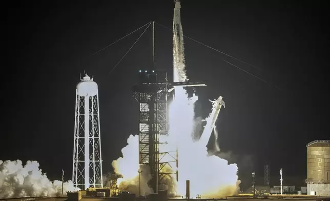 A SpaceX Falcon 9 rocket with a crew of four lifts off from pad 39A at the Kennedy Space Center in Cape Canaveral, Fla., Tuesday, Sept. 10, 2024. (AP Photo/John Raoux)