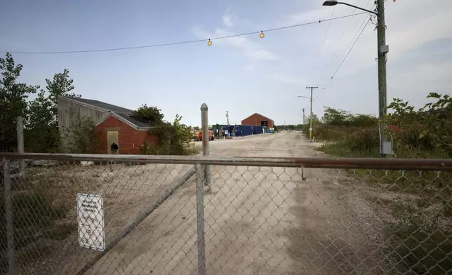 The Luckey FUSRAP (Formerly Utilized Sites Remedial Action Program) site, which was designated as such due to beryllium contamination, stands behind a fence in Luckey, Ohio, Wednesday, Sept. 11, 2024. (Kurt Steiss /The Blade via AP)