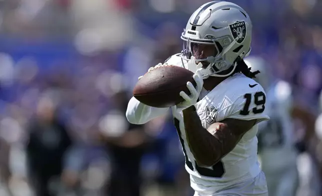 Las Vegas Raiders wide receiver DJ Turner (19) catches a pass against the Baltimore Ravens during the first half of an NFL football game, Sunday, Sept. 15, 2024, in Baltimore. (AP Photo/Stephanie Scarbrough)