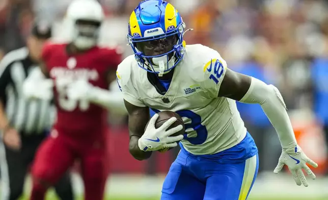 Los Angeles Rams wide receiver Tyler Johnson (18) runs against the Arizona Cardinals during the first half of an NFL football game, Sunday, Sept. 15, 2024, in Glendale, Ariz. (AP Photo/Ross D. Franklin)