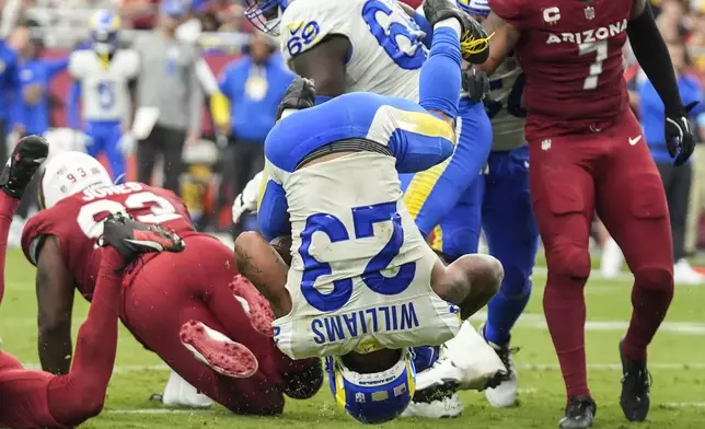 Los Angeles Rams running back Kyren Williams (23) scores a touchdown against the Arizona Cardinals during the second half of an NFL football game, Sunday, Sept. 15, 2024, in Glendale, Ariz. (AP Photo/Ross D. Franklin)