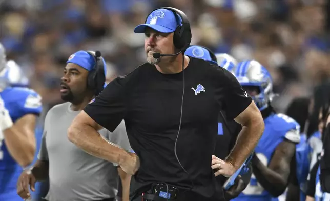 Detroit Lions head coach Dan Campbell watches against the Los Angeles Rams during the first half of an NFL football game in Detroit, Sunday, Sept. 8, 2024. (AP Photo/David Dermer)