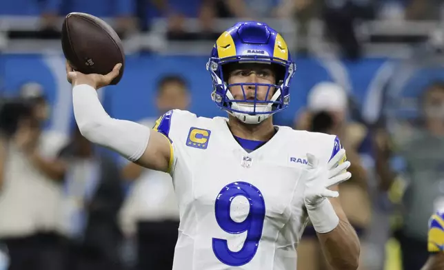 Los Angeles Rams quarterback Matthew Stafford (9) throws against the Detroit Lions during the first half of an NFL football game in Detroit, Sunday, Sept. 8, 2024. (AP Photo/Duane Burleson)